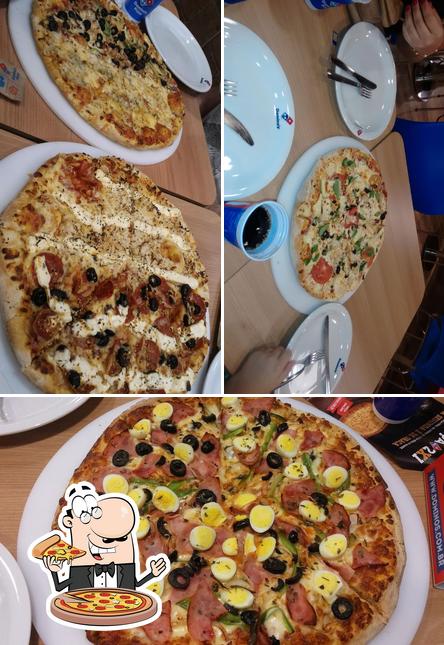 Escolha pizza no Domino’s Pizza