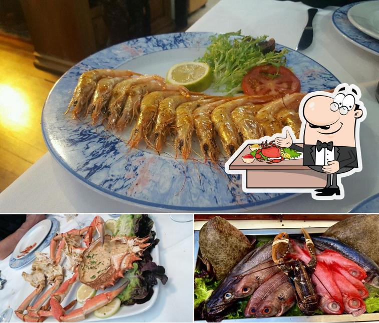Get seafood at Karola Etxea