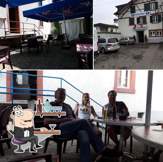 Siediti a un tavolo di Restaurant Schützen