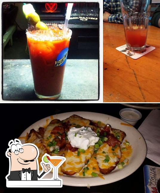 Check out the photo showing drink and food at Potbelly's Pub & Grill