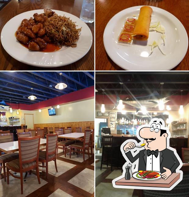 Take a look at the photo showing food and interior at Arrowana Restaurant
