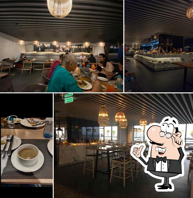 Take a seat at one of the tables at Siliguri Kitchen