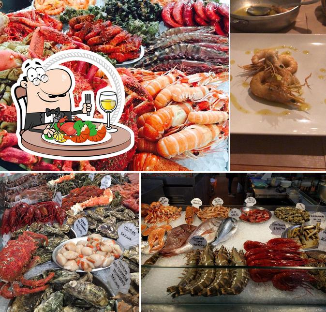 Попробуйте блюда с морепродуктами в "Marisco na Praça Mercado da Vila"