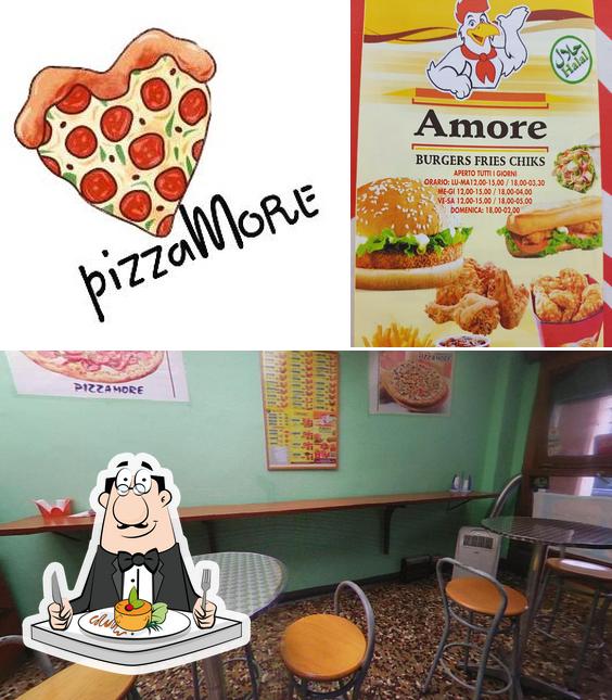 Questa è la immagine che presenta la cibo e interni di PizzAmore