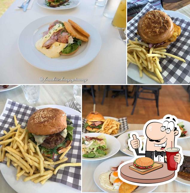 Order a burger at Daily Dose Cafe and Restaurant