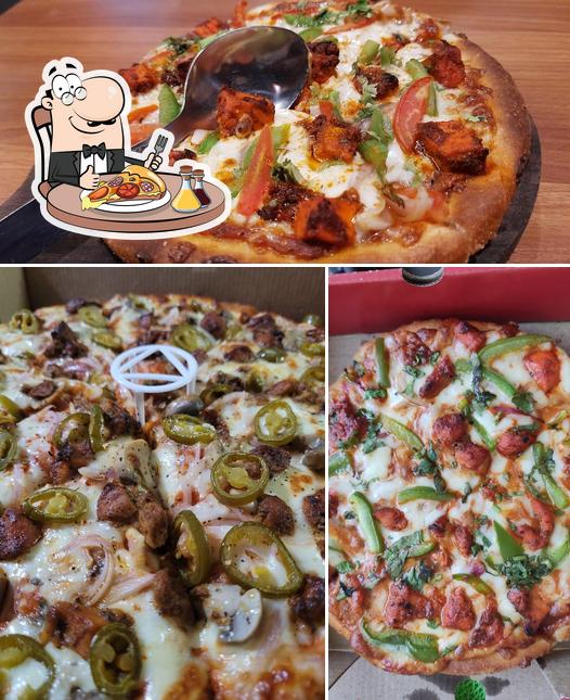 Try out pizza at Looco's Pizza Erattakulam