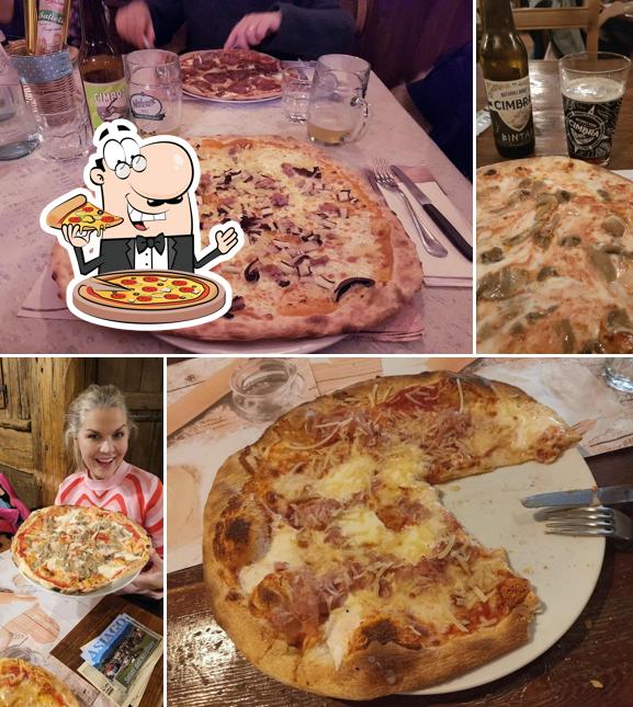 A Pizzeria Circolo Alpino, puoi prenderti una bella pizza
