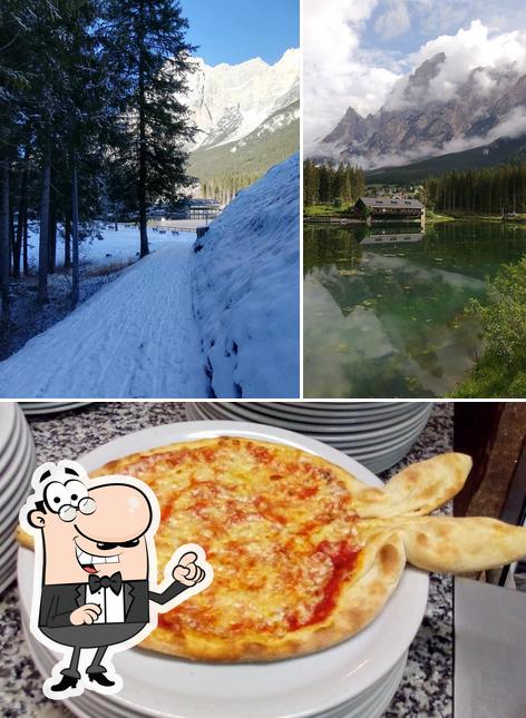 La foto della esterno e pizza di Chalet al lago