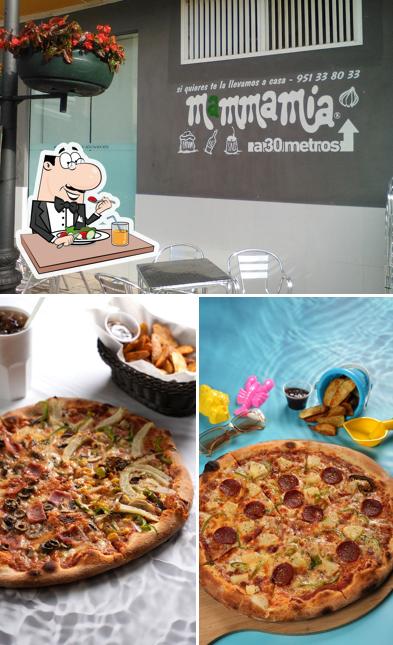 Mira las fotografías que muestran comida y interior en Pizzeria Mammamia
