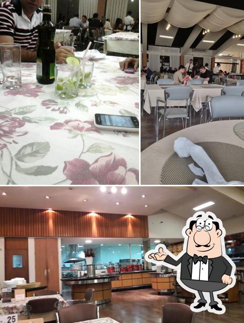 Sente em uma das mesas no Restaurante Dom Vergilio