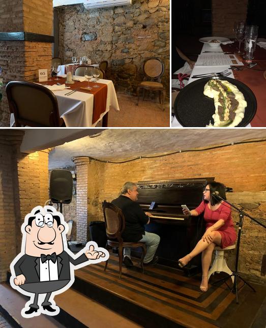 Esta é a ilustração apresentando interior e mesa de jantar a Restaurante Casa de Farinha