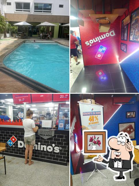 Sente em uma das mesas no Domino's Pizza - Meireles