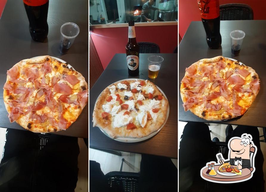 Prenditi una pizza a Pizzeria AL KM ZERO NIVIANO