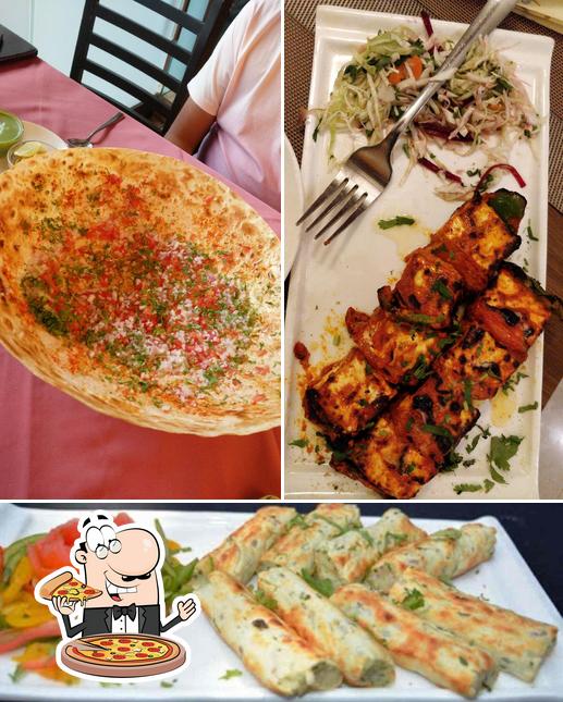 Get pizza at Utsav Restaurant