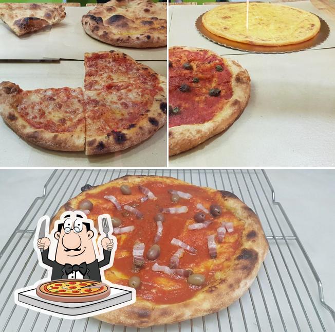 A L'enigma pizza in teglia e pala, puoi ordinare una bella pizza