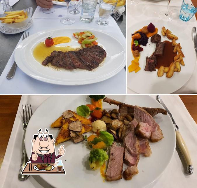 Prenditi i piatti di carne a Restaurant du Club Nautique