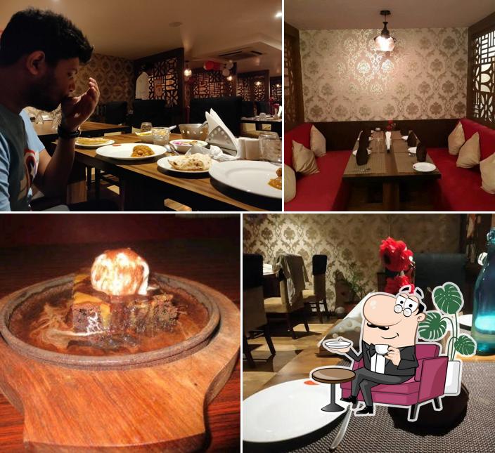 Take a seat at one of the tables at Moti Mahal Delux
