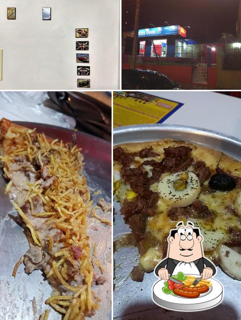 Confira a foto mostrando comida e exterior a Flavor Pizza