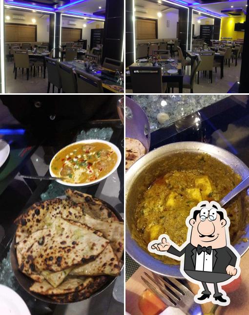 Take a look at the picture showing interior and food at The Rasoi