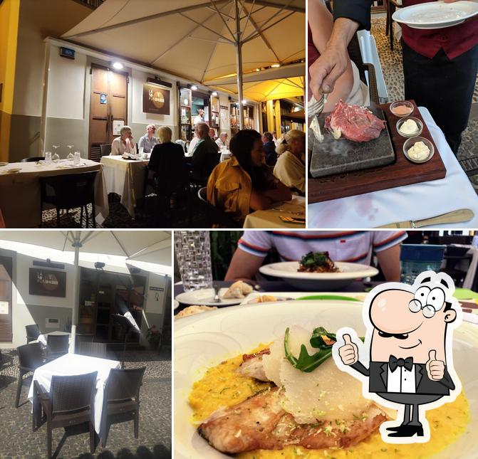 Взгляните на изображение кафе "Restaurante Lá ao Fundo"