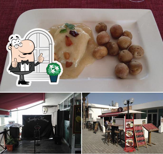 This is the picture showing exterior and food at Enyesque Bar Restaurante