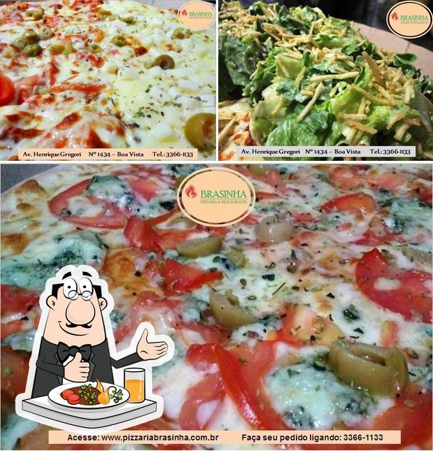 Comida em Pizzaria Brasinha