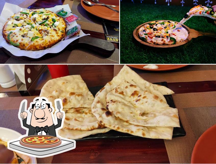 Get pizza at HalliKatte Family Restaurant - Restaurants near me BH Road, Nelamangala, bangalore