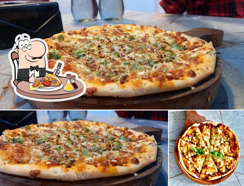 Try out pizza at Cafe Greenwood