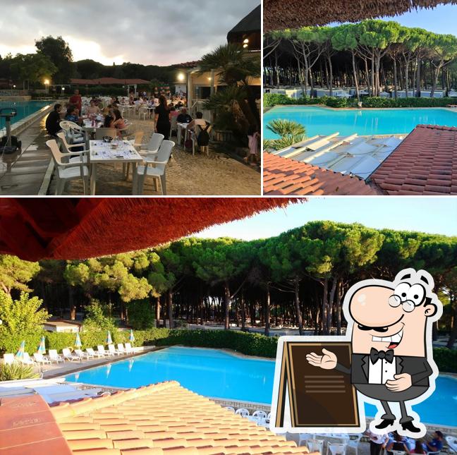 La immagine di esterno e tavolo da pranzo da Ristorante Zenzero