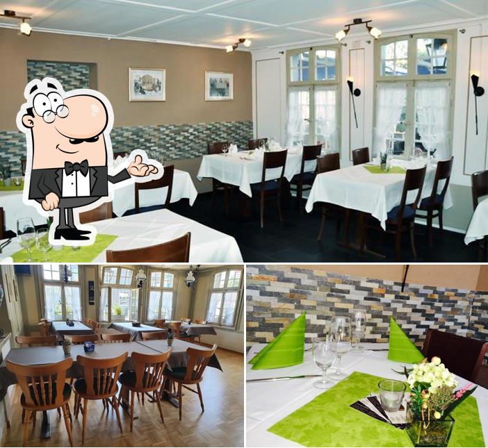 Installez-vous à l'une des tables de Dorfbeiz Hotel Krone Uetendorf