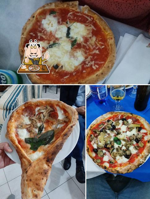 Scegli una pizza a Hotel Ristorante Il Tricolore