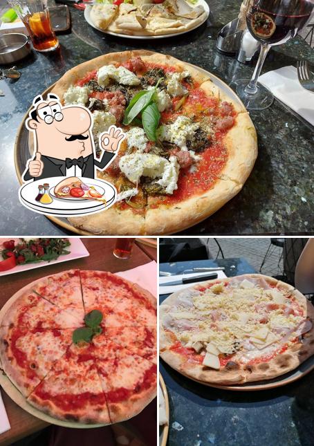 Scegli una pizza a Da John Bar-Pizzeria-Restaurant Italien 2000 Neuchâtel