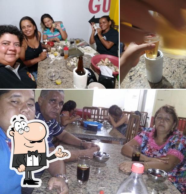 A ilustração do Malagueta Guaimum’s interior e bebida