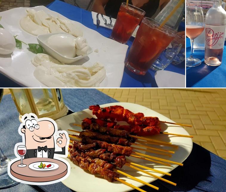 Guarda la immagine che raffigura la cibo e birra di ristorante House 21