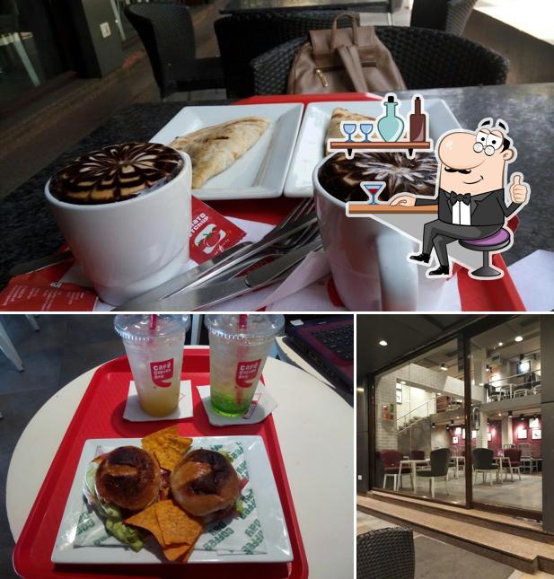 Take a seat at one of the tables at Café Coffee Day