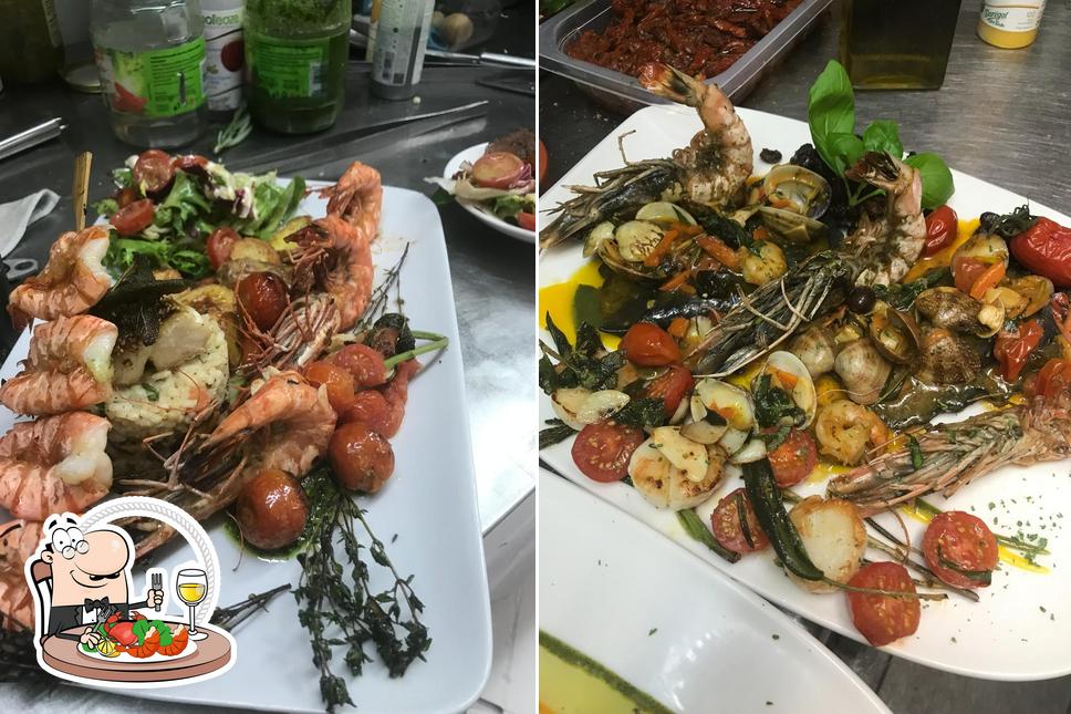 Order different seafood items served at Angolino Café Bar & Trattoria
