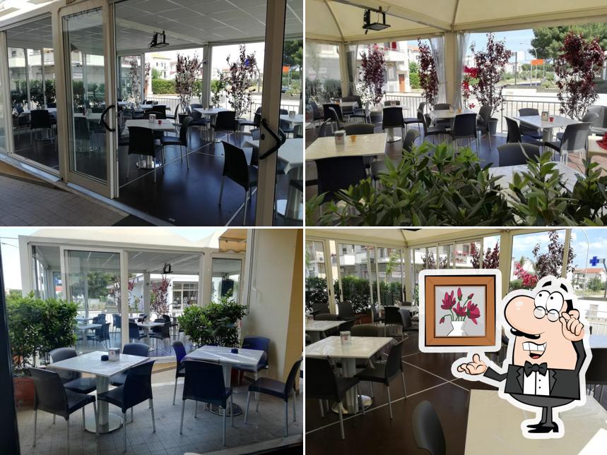 Gli interni di Too Chic Too Lunch Cafe - Bar E Tavola Calda
