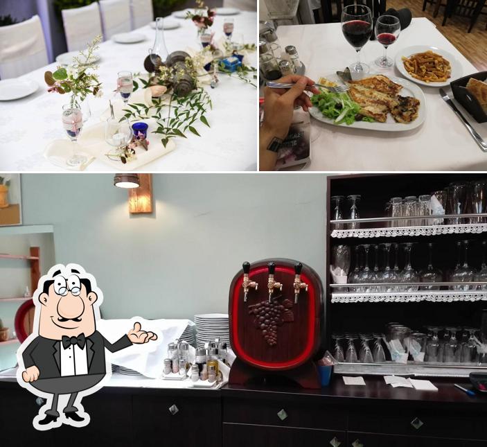 Take a look at the photo depicting interior and wine at 100 Shijet e Detit - Seafood Restaurant