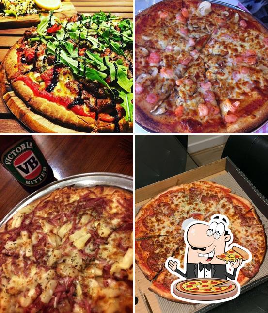 Try out pizza at Toto's Pizza House