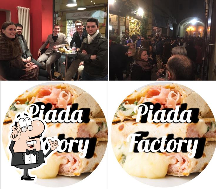 Questa è la immagine che raffigura la interni e cibo di Piada Factory Parma