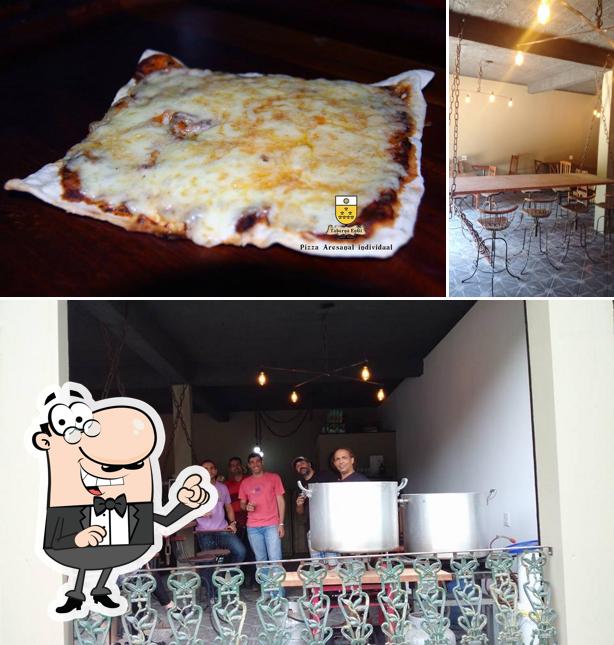 A imagem do Taberna EnGi’s interior e pizza