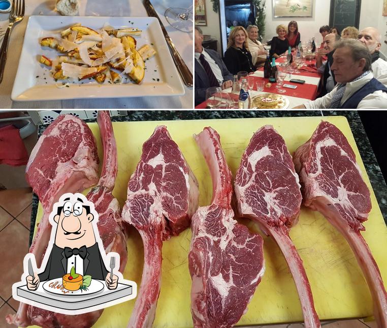 Dai un’occhiata alla foto che mostra la cibo e tavolo da pranzo di Ristorante Il San Lorenzo "La Macelleria"