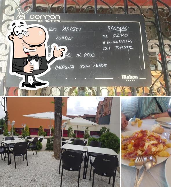 Look at the picture of Restaurante el Porrón de Humera