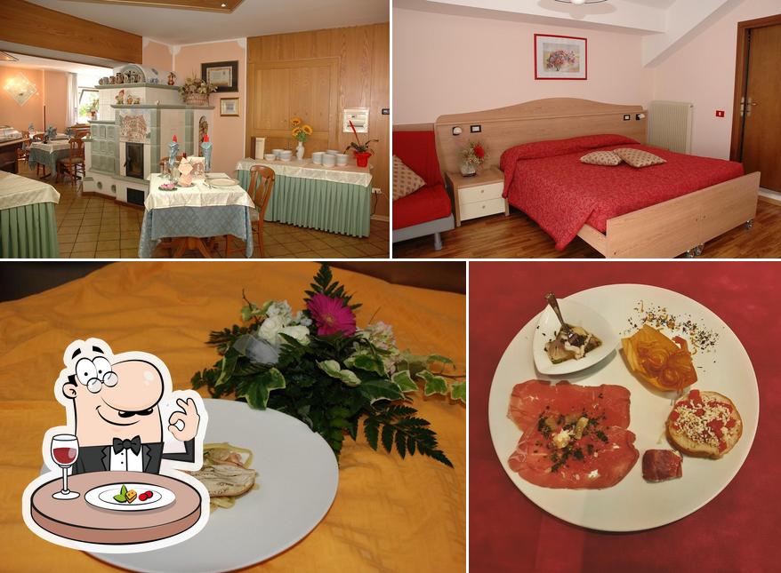 La immagine della cibo e interni di Albergo Ginevra