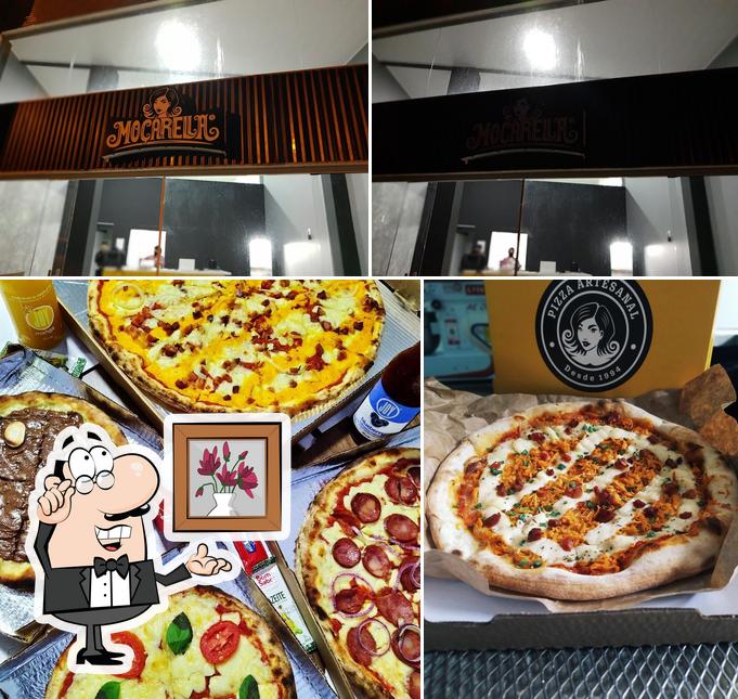 Посмотрите на эту фотографию, где видны внутреннее оформление и еда в Moçarella Pizzaria