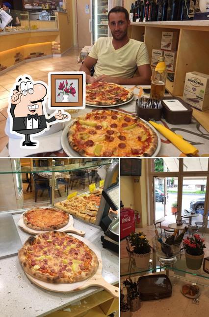 Guarda la foto che raffigura la interni e pizza di La Boutique del Pane