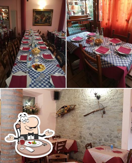 La immagine della tavolo da pranzo e interni di Trattoria, Pizzeria DAL LòLI