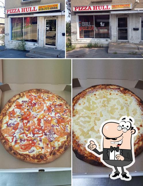 Voici la photo représentant la intérieur et nourriture sur Hull Pizza