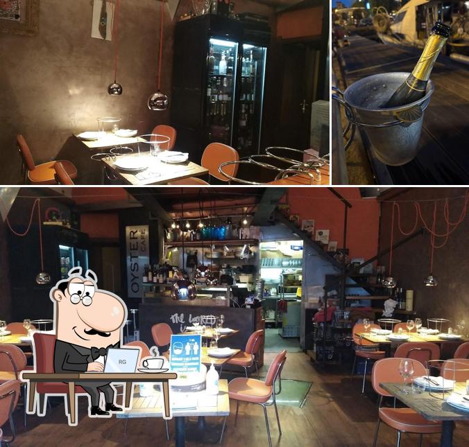 Guarda la immagine che raffigura la interni e esterno di Oyster Cafè