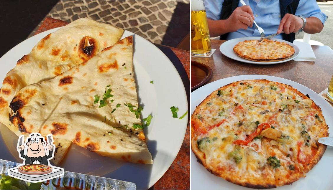 Probiert eine Pizza bei Heustüb'l indisch/italienische Küche